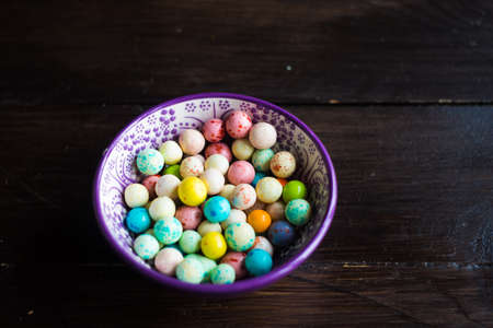 Traditional turkish snack leblebi in a bowl on rustic background with copy spaceの写真素材