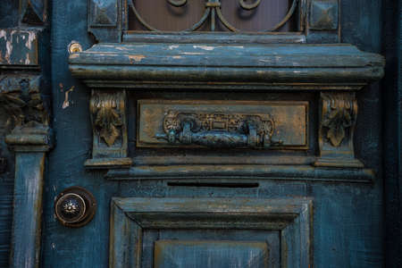 Old wooden door closeup with vintage detailsの写真素材