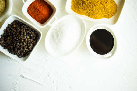Organic food concept with different spices and herbs on  rustic background with copy spaceの写真素材