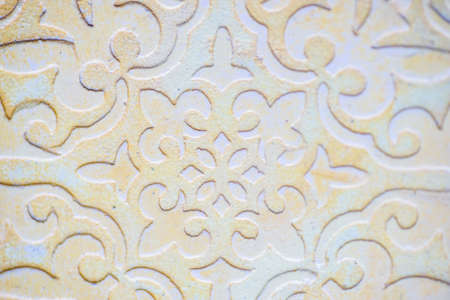 Bright colors moorish style tiles on rustic background with copa space