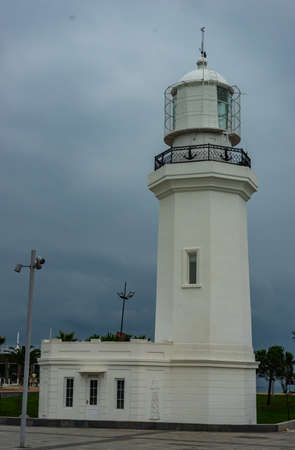 Batumi, Adjaria, Georgia - 11 JULY 2018: The building of Batumi sea port lighthouse on the coastのeditorial素材