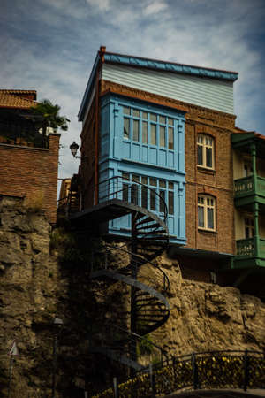 Traditional georgian carving balconies on Meidan square,  and cableway to Narikala castleのeditorial素材