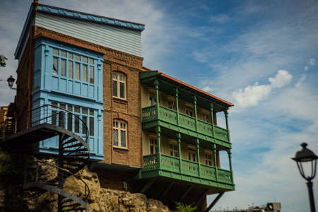 Traditional georgian carving balconies on Meidan square,  and cableway to Narikala castleのeditorial素材