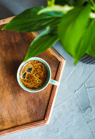 Cup of black coffee on rustic background with copy spaceの写真素材