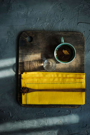 Cup of black coffee on rustic background with copy space