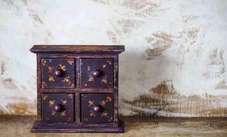 Vintage wooden box with four boxes on rustic background with copy spaceの写真素材