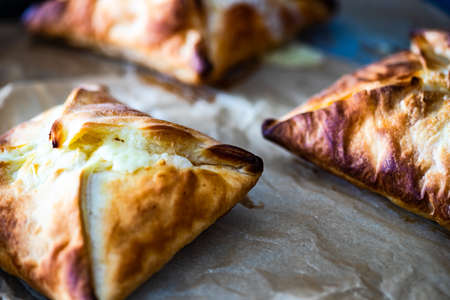 Just baked traditional georgian penovani khachapuri on a table