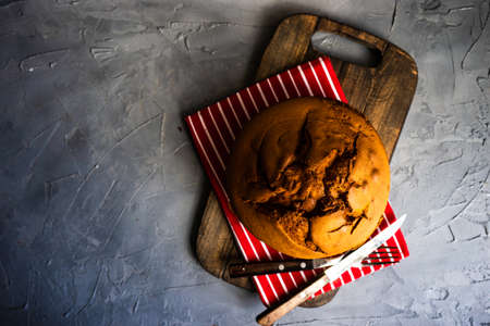 Sweet cake as a dessert concept on rustic background with copy space