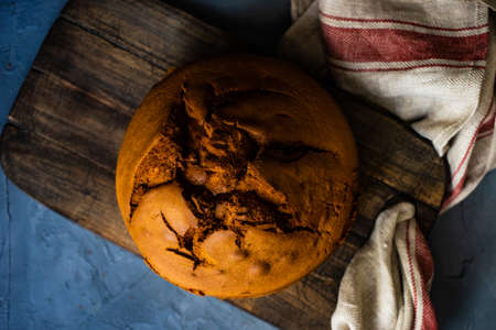Sweet cake as a dessert concept on rustic background with copy space
