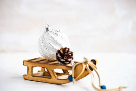 Christmas card concept with vintage white christmas balls on white backgroundの写真素材