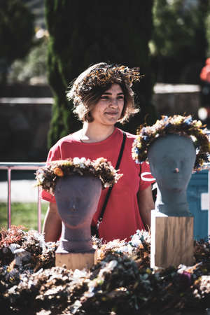 TBILISI, GEORGIA, 2018, October 06: Beautiful georgian girls are preparing flower composition on the...