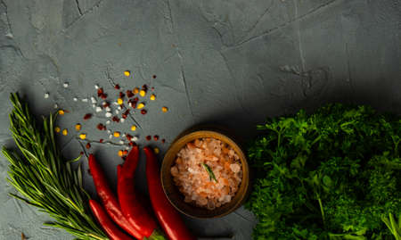 Organic spices and herbs  on rustic backgroundの写真素材