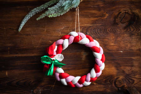 Christmas card concept with handmade decoration on dark wooden background with copy spaceの写真素材