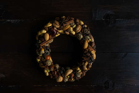 Christmas iterior concept with handmade decor on dark wooden backgroundの写真素材