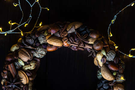 Christmas iterior concept with handmade decor on dark wooden background
