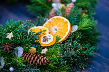 Christmas interior concept with fir tree wreath on the door
