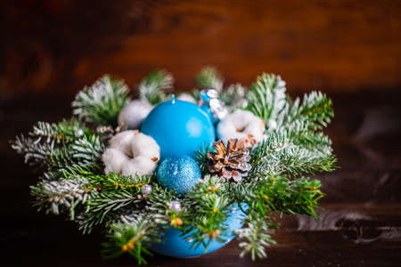 Christmas interior concept with candles and spice decor on rustic background with copy spaceの写真素材