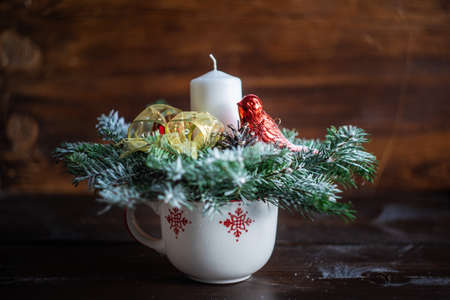 Christmas interior concept with candles and spice decor on rustic background with copy spaceの写真素材