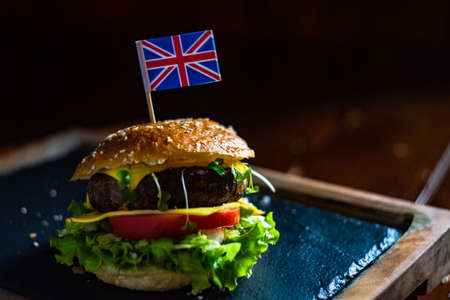 Classic british hamburger on rustic background with copy spaceの写真素材