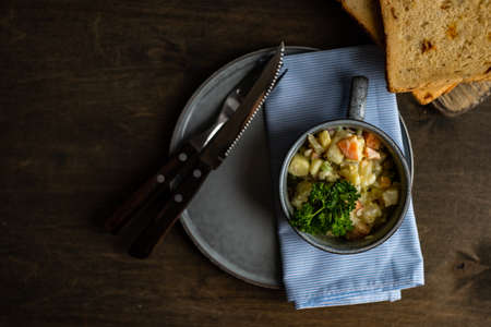 Traditional New Year and Christmas olivier salad on rustic background