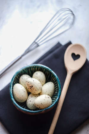Cooking concept with eggs on white background with copy space