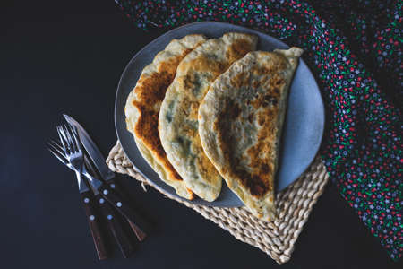 Traditional azerbaijan cuisine flat bread with herbs kutaby