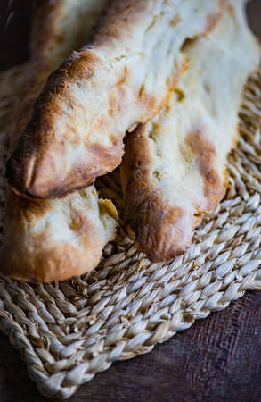 Traditional georgian bread shotis puri on rustic background with copy spaceの写真素材