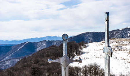 Famous Didgori battle monument with giant sword and sculptures of soldiers close to Tbilisi in Caucasus mountain rangeの写真素材