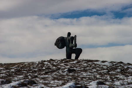 Famous Didgori battle monument with giant swords and sculptures of soldiers close to Tbilisi in Caucasus mountain rangeの写真素材