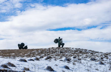 Famous Didgori battle monument with giant swards and sculptures of soldiers close to Tbilisi in Caucasus mountain rangeの写真素材