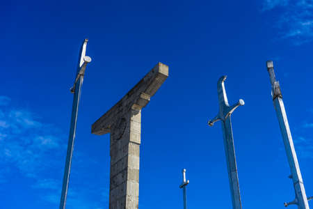 Famous Didgori battle monument with giant swards and sculptures of soldiers close to Tbilisi in Caucasus mountain rangeの写真素材