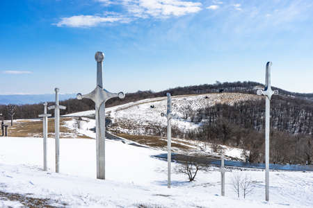 Famous Didgori battle monument with giant swards and sculptures of soldiers close to Tbilisi in Caucasus mountain rangeの写真素材