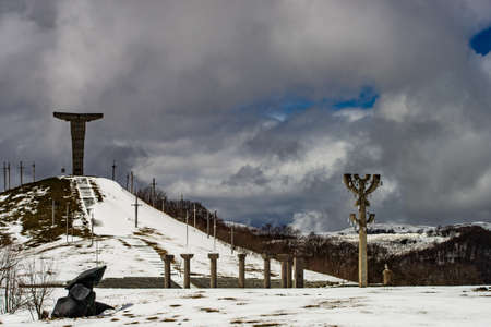 03 APRIL 2019, GEORGIA, TBILISI, Famous Didgori battle monument with giant swards and sculptures of soldiers close to Tbilisi in Caucasus mountain rangeのeditorial素材