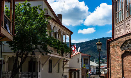 28 May 2019, TBILISI, GEORGIA: View to the streets of Old Town of Tbilisi with traditional wooden...