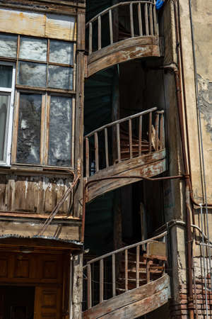 03 JUNE 2019, TBILISI, GEORGIA: Famous spiral stairs in inner yards of old houses in Old Tbilisi, Georgiaのeditorial素材