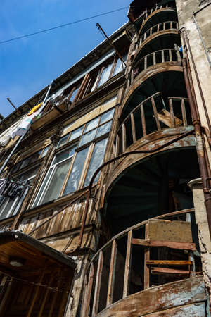 03 JUNE 2019, TBILISI, GEORGIA: Famous spiral stairs in inner yards of old houses in Old Tbilisi, Georgiaのeditorial素材