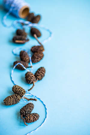 Christmas festive frame concept on blue background with copy spaceの写真素材