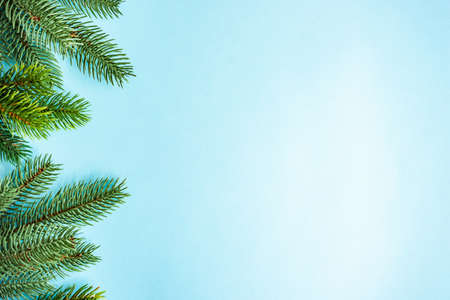 Christmas festive frame concept on blue background with copy space