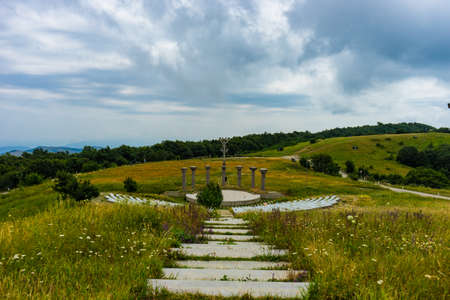 20 JULY 2019, GEORGIA, TBILISI, Famous Didgori battle monument with giant swards and sculptures of soldiers close to Tbilisi in Caucasus mountain rangeのeditorial素材