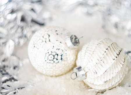 Christmas holiday concept with balls on bright background with copy space