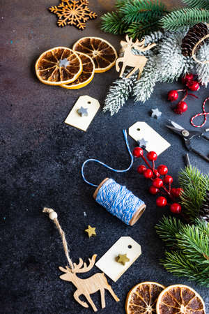 Christmas holiday flatlay with xmas decor on stone background with copy spaceの写真素材