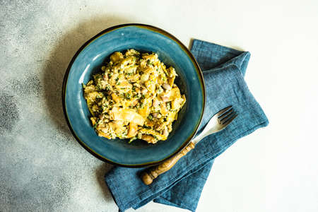 Traditional georgian summer lobio dish with  french beans with eggs and herbs on stone background with copy spaceの写真素材