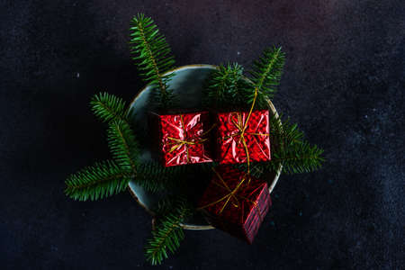 Holiday table seting with xmas tree and cutlery on stone background with copy spaceの写真素材