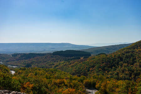 Mountain slopes covered with autumnal forest, beautiful landscape close to Tbilisi, Georgia