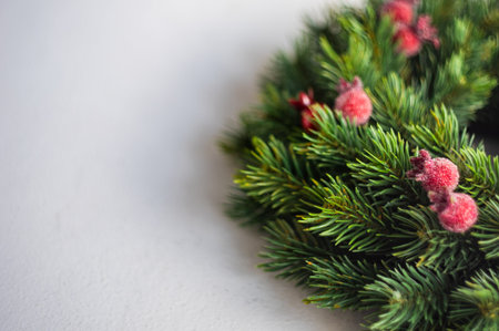 Decorated Christmas wreath on the stone background with copy spaceの写真素材