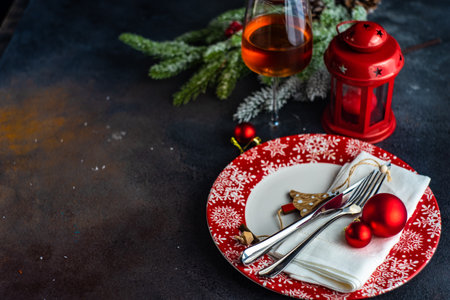 Christmas table setting with decor and cutlery on stone background with copy spaceの写真素材