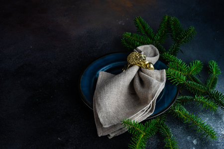 Christmas table setting with decor and cutlery on stone background with copy spaceの写真素材