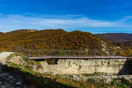 Autumnal Ujarma castle ruins hidden in Caucasian mountain on the way from Kartli to Kakheti in...