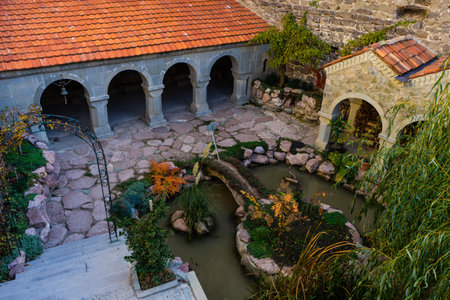18 NOVEMBER 2019, GEORGIA: Inner yard in famous man monastery Mzovreti located in medieval castle in...