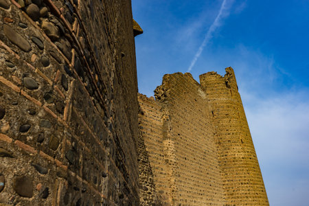 27 NOVEMBER 2019, KSANI, GEORGIA: Ruins of famous medieval castle Qsnis tsikhe on hill top over Ksani townのeditorial素材